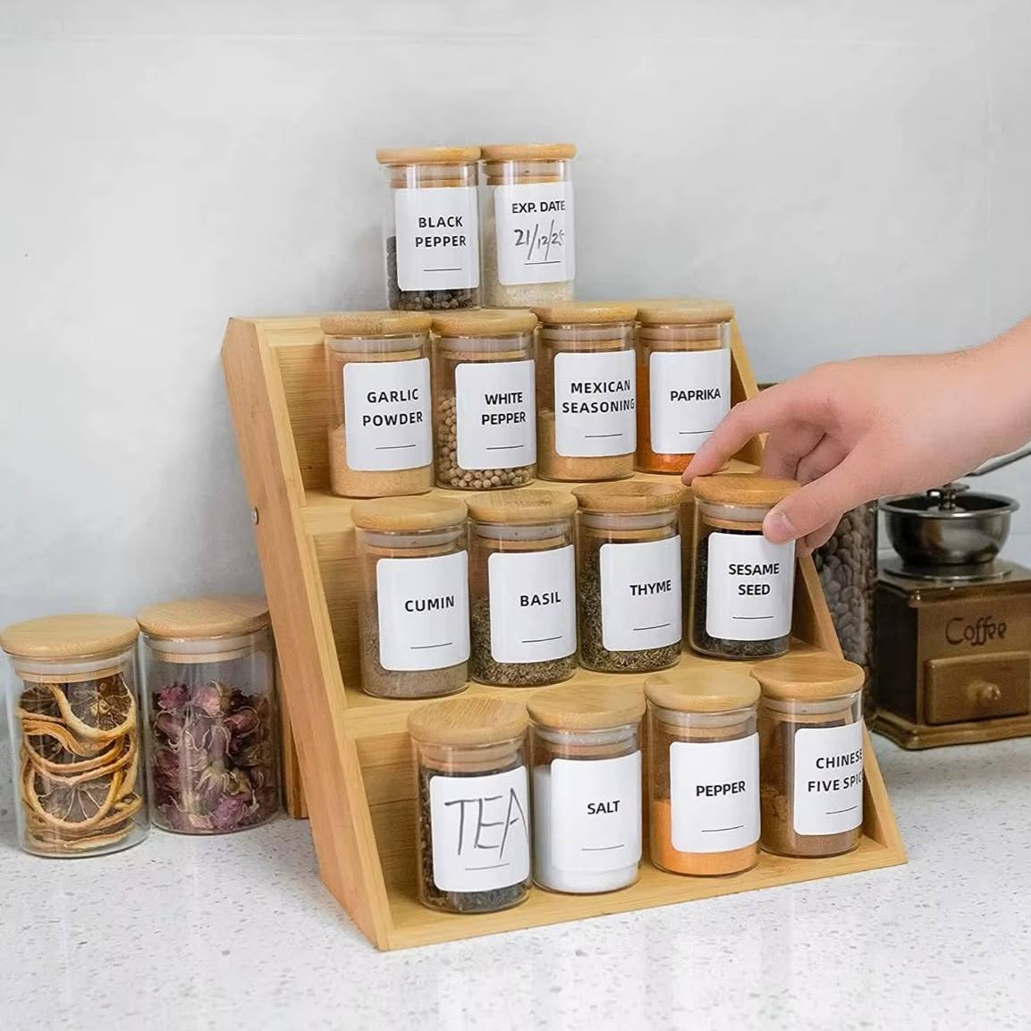 A tiered spice jar organizer for your kitchen with 12 jars