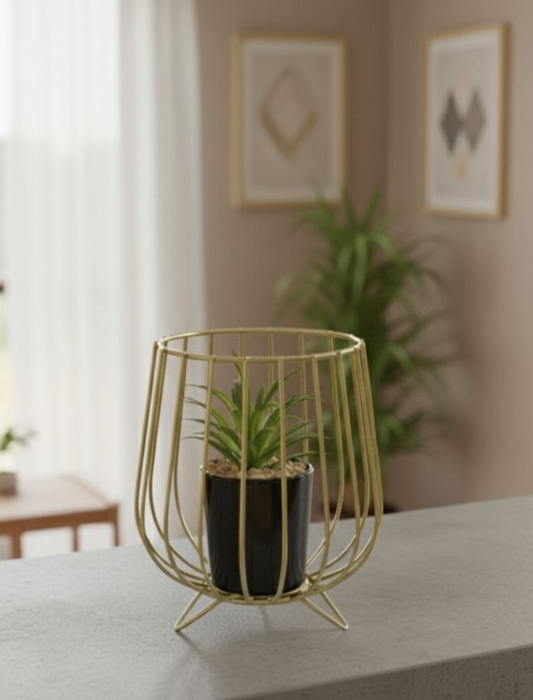 A chic cactus pot with a gold metal stand