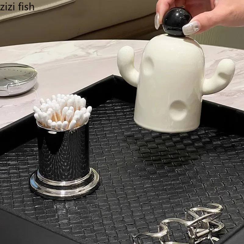 Porcelain cactus, toothpicks, or cotton swabs