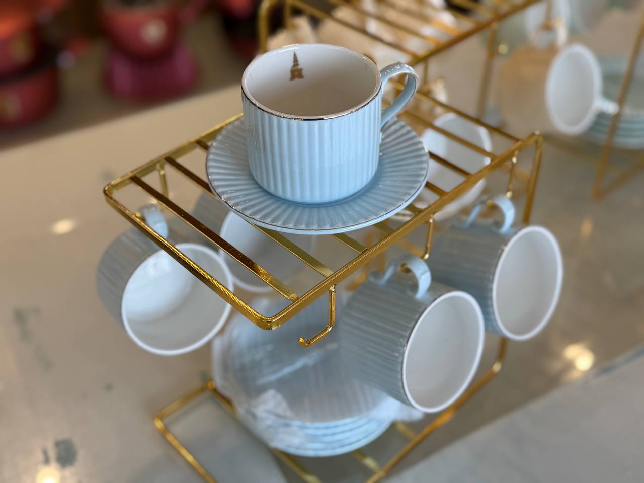 Porcelain tea set with a holder